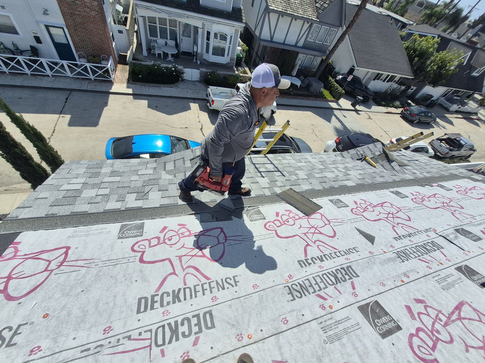 Rational Roofing crew replacing a tile roof in Orange County.